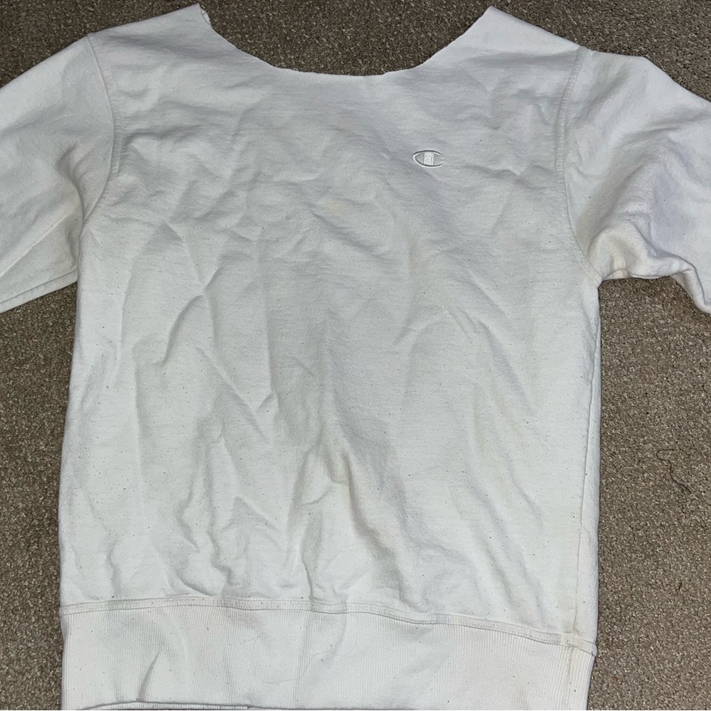 White Champion crewneck: off the shoulder, cut neck